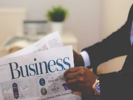 reading business newspaper