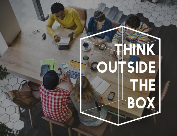 Team working outside of the box