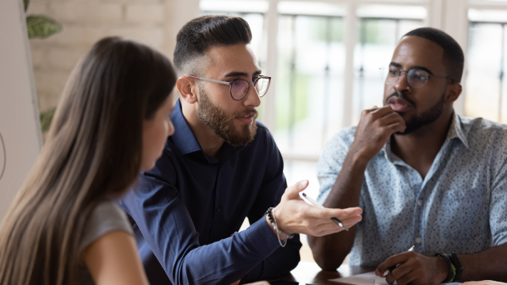 Three people talking