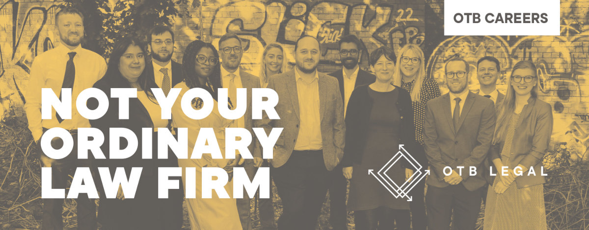 Not your ordinary law firm Team picture with text saying not your ordinary law firm
